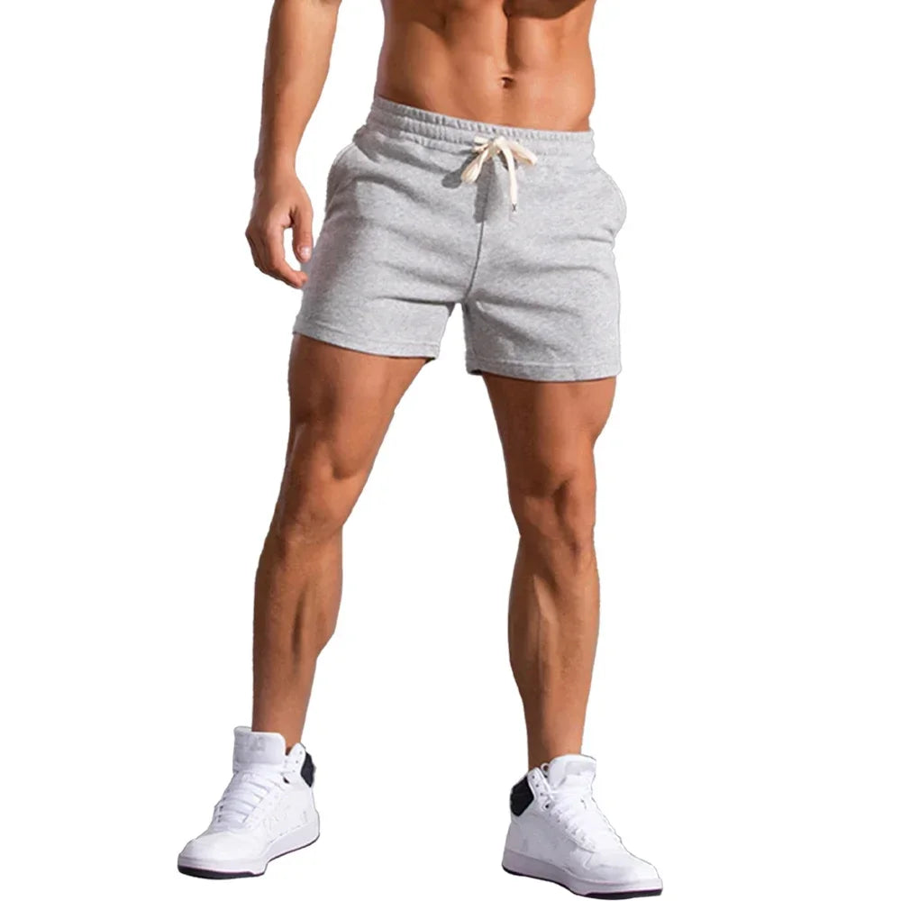 2025 Mens Gym Summer Fitness Shorts White Breathable Surffing Seaside Resort Solid Running SportswearElastic Casual Sport Shorts