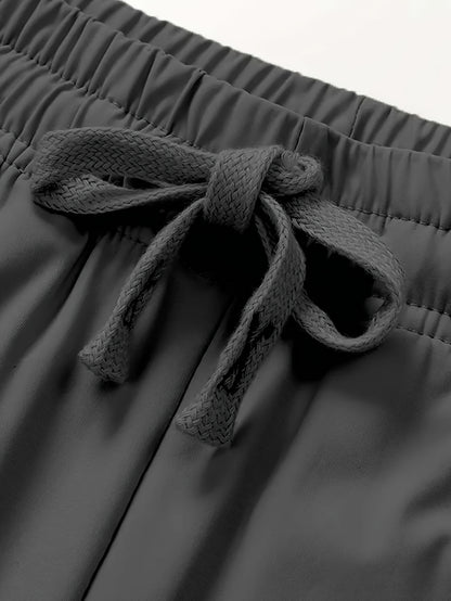 1pc Women's Plus Size Elegant Solid Black Sweatpants with Drawstring Waist & Zipper Pocket - Stretchy Polyester Blend, Machine Washable for All-Season Outdoor Activities, Plus Size Sweatpants - ZOOMNSTORE
