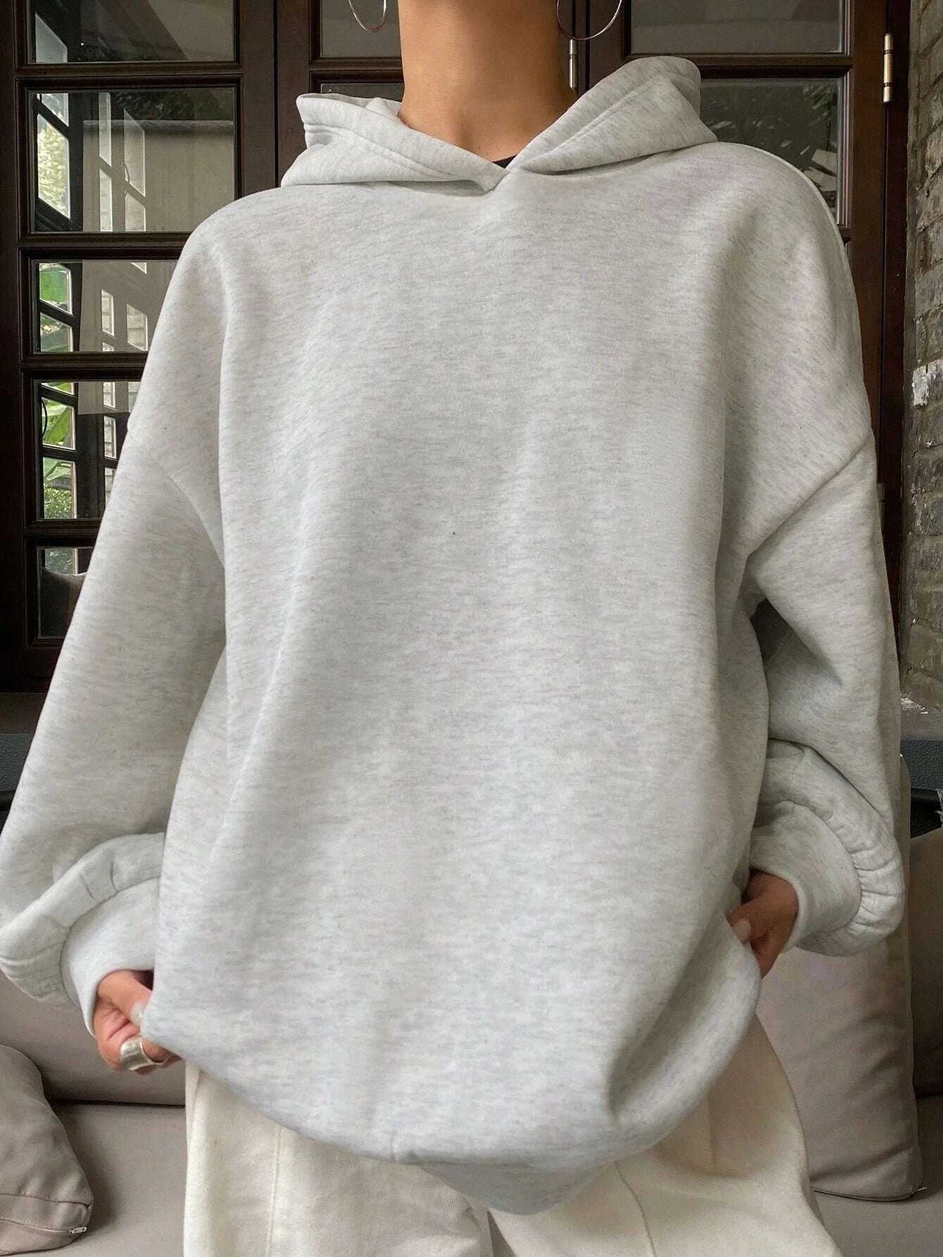 Women's Solid-Color Hooded Casual Sweatshirt with Warm Lining and Relaxed Fit