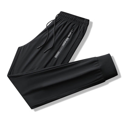 Men's Athletic Stretchy Ice Silk Quick Dry Pants Zipper Pockets Lightweight Sweatpants Outdoor Hiking Breathable Running Workout