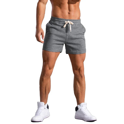 2025 Mens Gym Summer Fitness Shorts White Breathable Surffing Seaside Resort Solid Running SportswearElastic Casual Sport Shorts