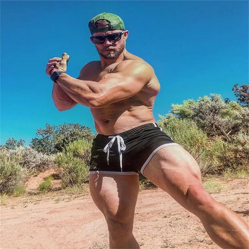 Men Gym Fitness Shorts Bodybuilding sports Jogging shorts Male 2022 Summer Cool Breathable Mesh The big size casual men Shorts