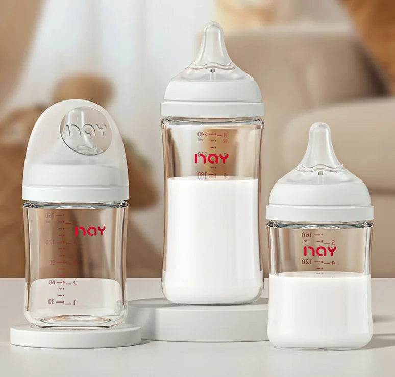 Newborns' wide caliber anti choking glass milk bottle 0-3 months bottle straight body newborn baby bottle