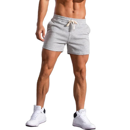 2025 Mens Gym Summer Fitness Shorts White Breathable Surffing Seaside Resort Solid Running SportswearElastic Casual Sport Shorts