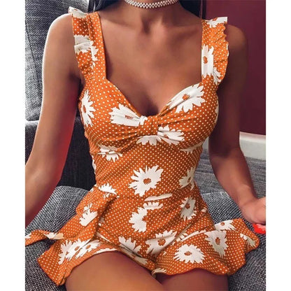 Breezy Sleeveless Dress with Vibrant Floral Print and Elegant V-Neck ﻿