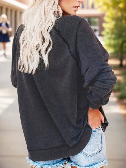 Women's round-neck long-sleeved pullover with shoulder straps. Please send me more in champagne color with prints.