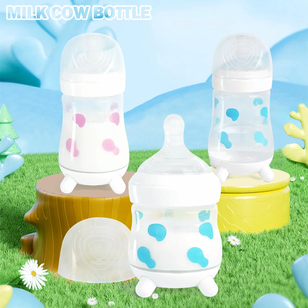 180ML/270ML cute cow shaped anti bloating baby PP bottle without handle, silicone replacement nipple available for sale