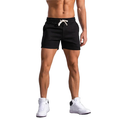 2025 Mens Gym Summer Fitness Shorts White Breathable Surffing Seaside Resort Solid Running SportswearElastic Casual Sport Shorts